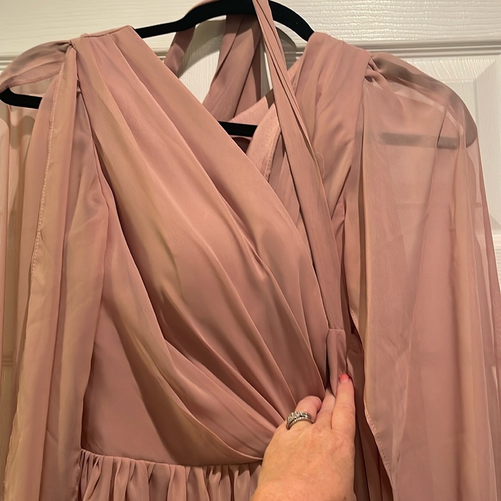 New wrap blush pink long wedding dress. Shear long sleeves with liner.